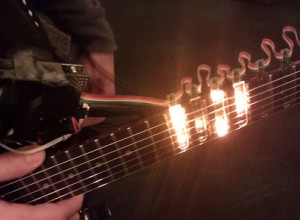 The Tabber uses an Arduino Uno microprocessor to control strips of LEDs in the neck of a guitar